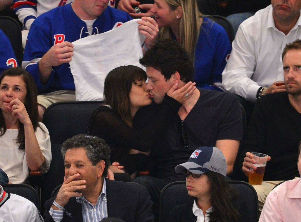 Lea Michele and Cory Monteith attend the New York Rangers vs New Jersey Devils playoff game 